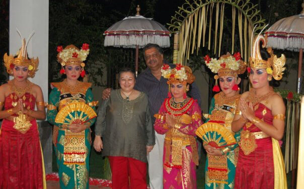 The author celebrates her birthday with her husband and Balinese dancers in Ubud, Bali